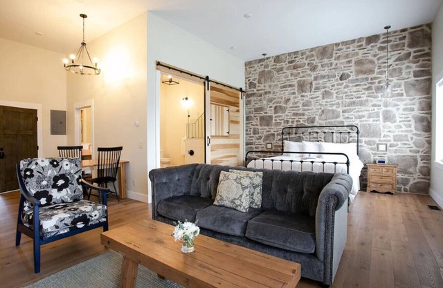 Unique Rustic Suite with Jacuzzi Tub, Kitchen, Fireplace, and Living Room