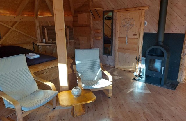 Unique wooden hut with mountain panorama