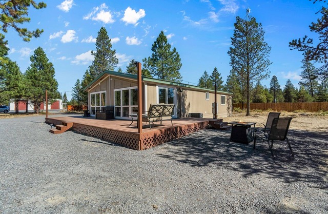 Updated Beauty has Queen Suite, Acreage, Pickleball Court and Peacocks!