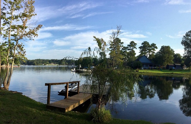 Updated Home across the street from the lake. With Private Dock and Land.