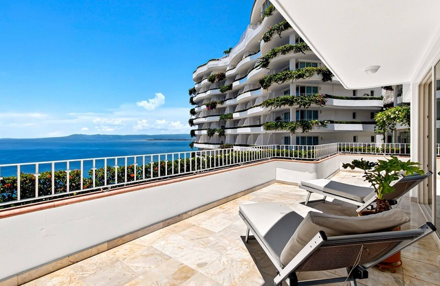 Upscale coastal suite with private terrace, ocean views, pool & hot tub