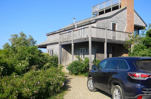 Upside down house near beach with stunning view over the moor to the ocean