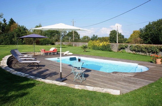 Vacation cottage with pool located in quiet village surrounded by nature