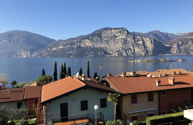 Vacation home with private garden, lake and mountain views near the eastern shore of the lake.