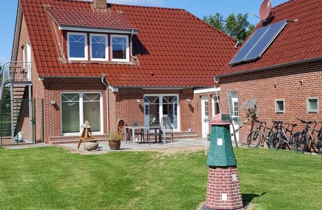 Very well-kept apartment, a few minutes to the dike, dogs welcome