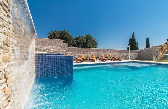Villa for big demands with large pool, sauna, whirlpool, fitness equipment, billiards and professional outdoor kitchen