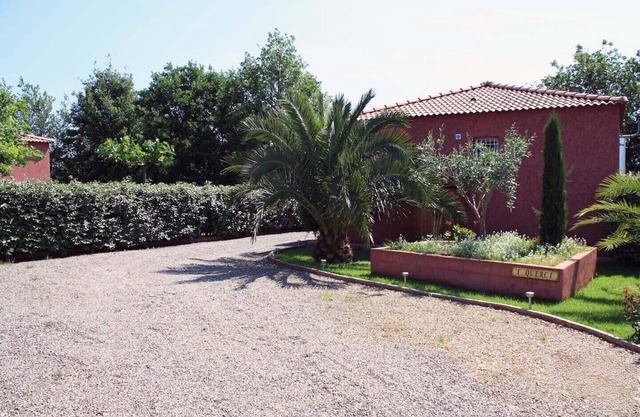Villa in private residence by the sea in shady park.