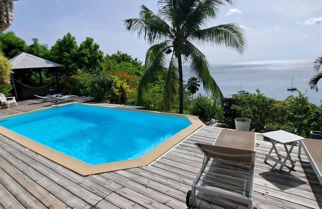 Villa Kaz in Thomy, pool and Spa Panoramic sea view of Pointe Noire bay