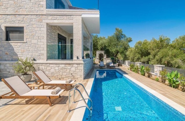 Villa Olive Green is new modern stone house
