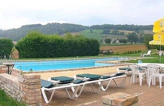 Villa Pavone E: A graceful apartment that covers the entire first floor of a villa surrounded by the greenery, with Free WI-FI.