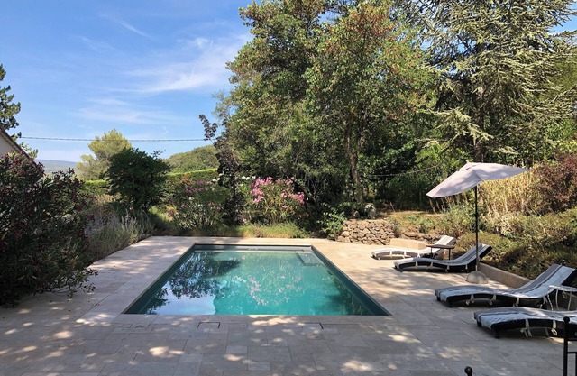 Villa set in wooded grounds with swimming pool, zome and tree house.