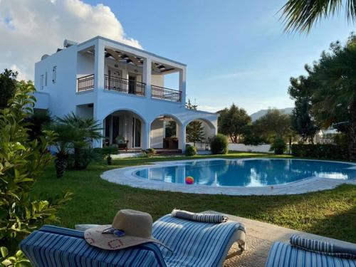Villa Sofia with garden, pool and lounge areas