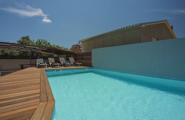 Villa with private pool, playground, sun terrace, WLAN