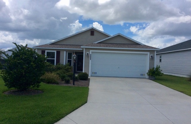 Village of Charlotte Retreat: 3BR, 2BA Home, Golf Cart, & Dog-Friendly Bliss