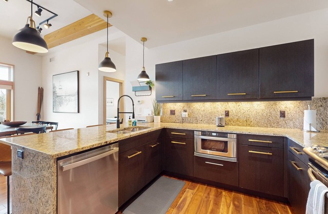 Walkable condo with mountain-view deck, firepit & bar/restaurant downstairs