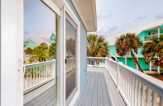Water-view home with balcony & boat dock & tennis court access