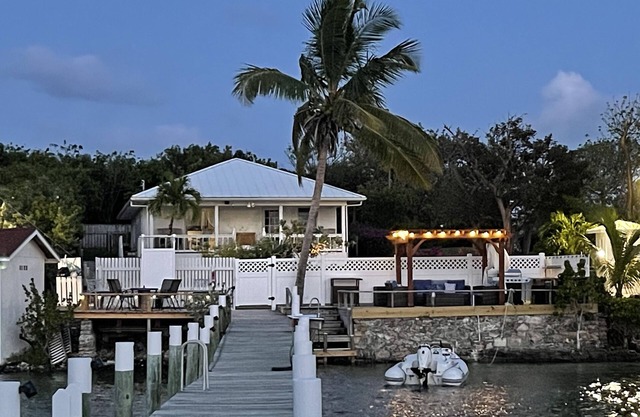 Waterfront Beach Bungalow with 150 Foot Dock on Guana Cay and Waterside Pergola