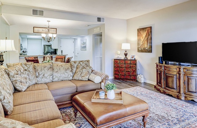 Waterfront condo with scenic balcony - pool, central AC, private washer/dryer