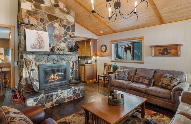 Waterfront home in Sagle with a dock, hot tub, and large lawn for families