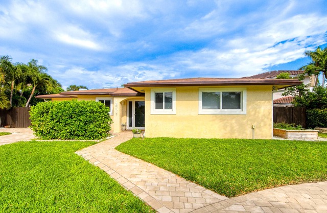 Waterfront home with private pool, outdoor living area, washer/dryer, & AC