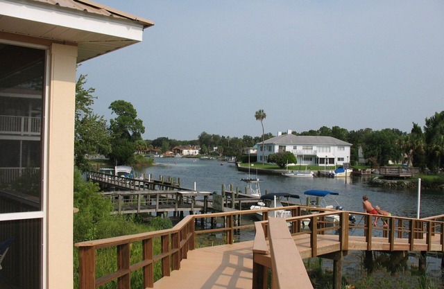 Waterfront living in a secure gated community close to shopping and restaurants.