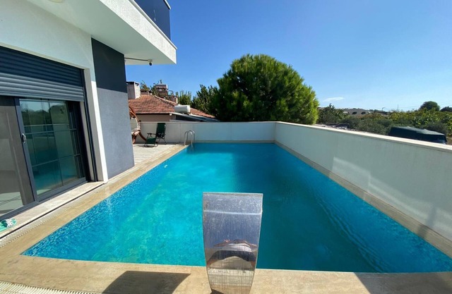Welcome to your peaceful home with a pool in the center of Çeşme