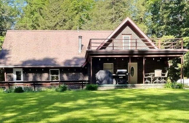 Welcome to your perfect getaway! Nestled on a semi-secluded 2-acre lot, this charming brick Cape Cod is centrally located between Cook Forest and Clear Creek State Parks. Surrounded by trees, this cozy retreat offers a peaceful escape.