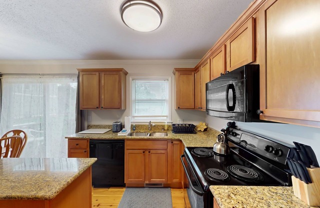 Well-located home in town with sunrise views, deck & great backyard
