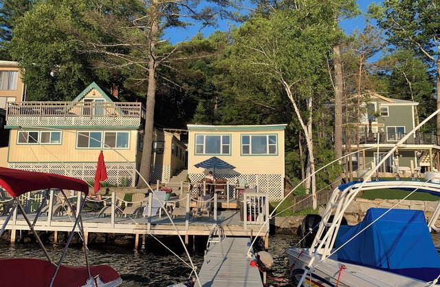 Winnipesaukee waterfront family compound with 40 foot dock and amazing sunsets!