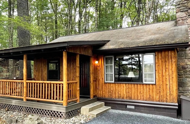 Woodside Cabin, tucked in a circle of towering white pine and mountain laurel.