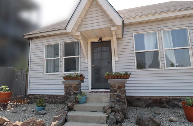 You will enjoy this updated 1907 Cottage— it is a hidden gem