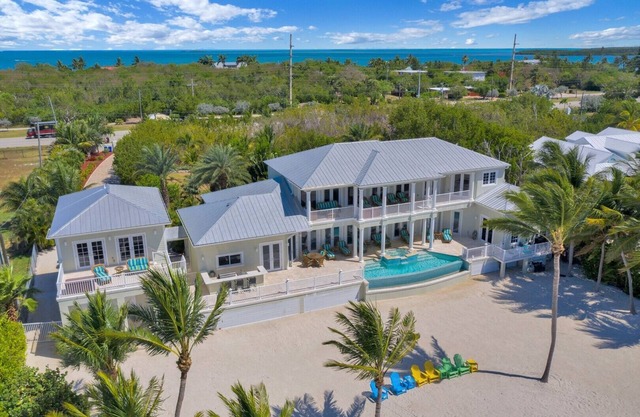 Your PRIVATE OCEANFRONT ESTATE awaits! Dive into the Infinity Pool & 150' Beach