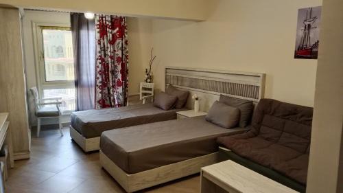 Al Alamayn Apartment | قرية اكوافيو