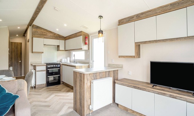Bridport House | 12ft-wide luxury caravan with one double and two twin.