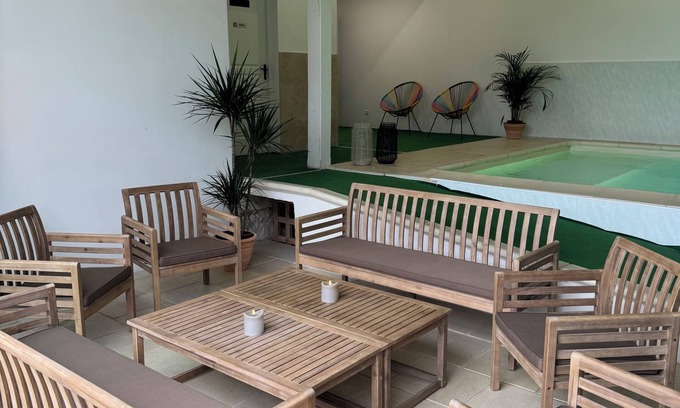 Restigne House | 14-person gîte with heated indoor pool, games room and Jacuzzi