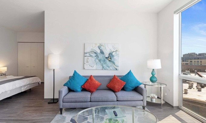 Palmer Square Apartment | 1BR City Loft With Modern Glass Views