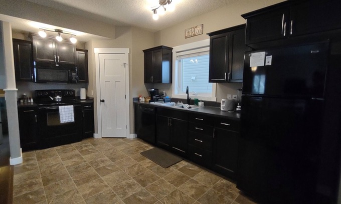 Grande Prairie House | 2 Bedroom Basement Suite - Fully Stocked, Clean & Pet-Friendly!