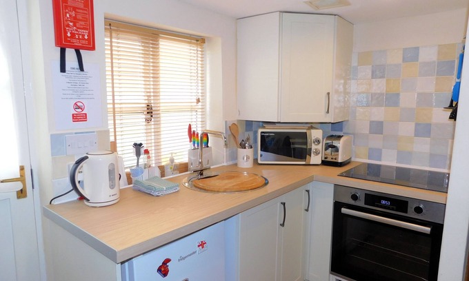 Sheringham Cottage | 2 Museum Cottages - traditional flint cottage, a cosy, romantic retreat in the heart of Sheringham,