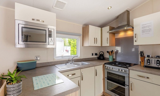 Westmarsh House | 2021: 12ft-wide caravan ideal for families with one double and two twin.