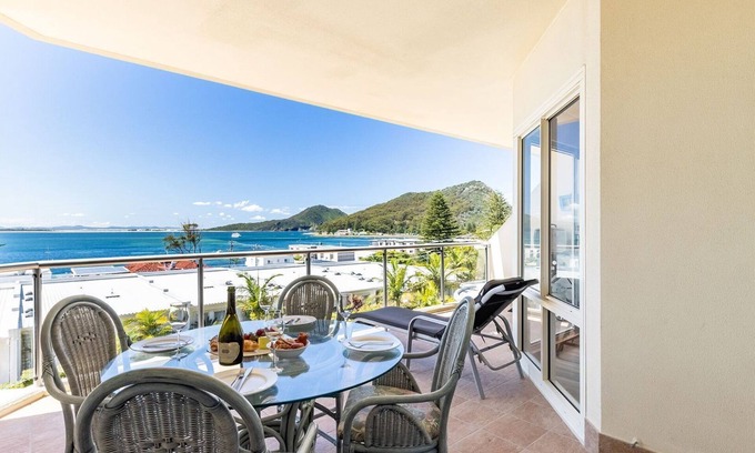 Shoal Bay Apartment | 203 The Breakwater, 2 Messines St - magical unit with lift, pool, views and aircon
