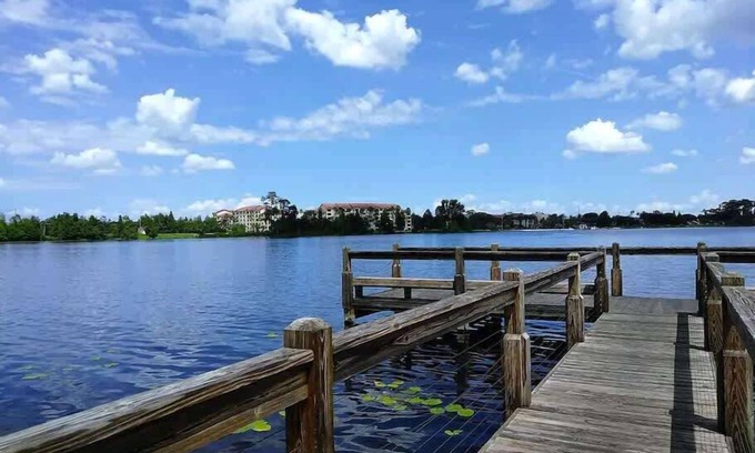 Vista del Lago House | 25%off/Disney5mi/Fishing/2HotTub/3Pools/Gym/Courts