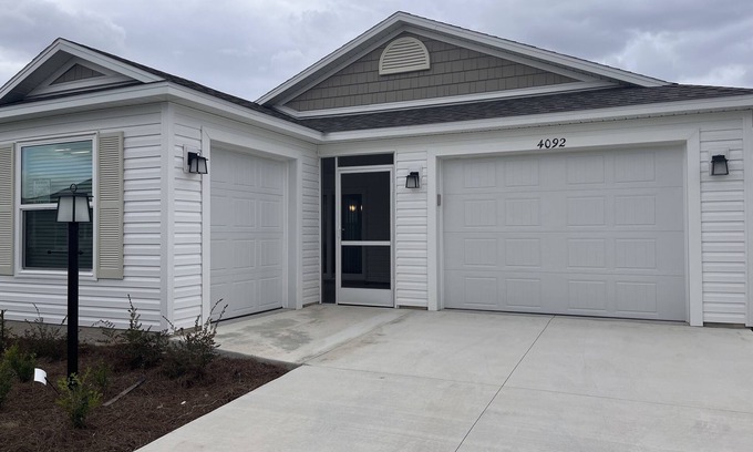 Wildwood House | 2BR/2BA Patio Villa in the Village of DeLuna