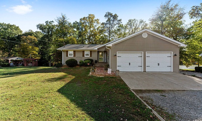 Cadiz House | 3 bedroom/2 full bath lakefront home with gentle slope to private covered dock