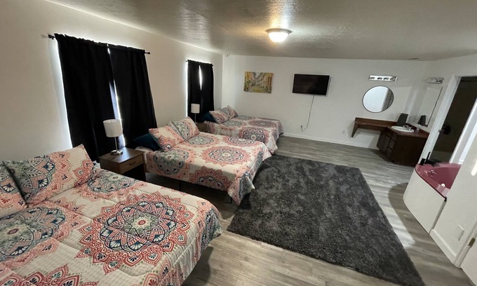 Emery County House | 3 queen beds with Jacuzzi tub and private bath, TV and walk-in closet & Mt. View