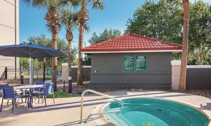 Orlando House | 3 x King Bed Exec. Room, Pool View at La Quinta Inn by Wyndham Orlando UCF