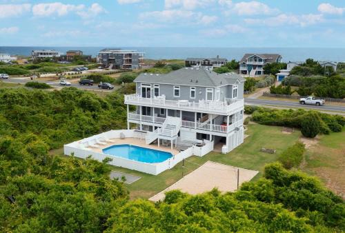 Southern Shores House | 3054 - Latitude Adjustment