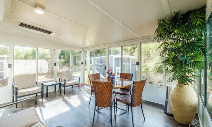 Commonwealth Park House | 4 bed/2 bath home with a 3-season sunroom with a variety of nice amenities