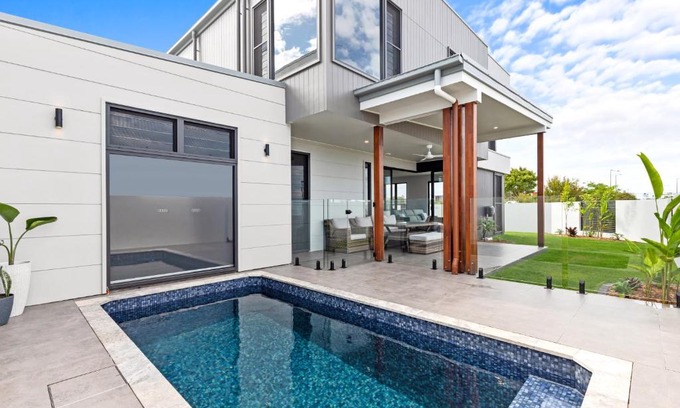 Pelican Waters House | 4 Bedroom Home in Pelican Waters with Heated Inground Pool