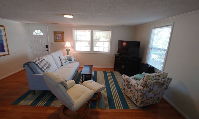 Pine Knoll Shores Cottage | 4 bedroom retreat just two blocks from ocean access. Pet-friendly!