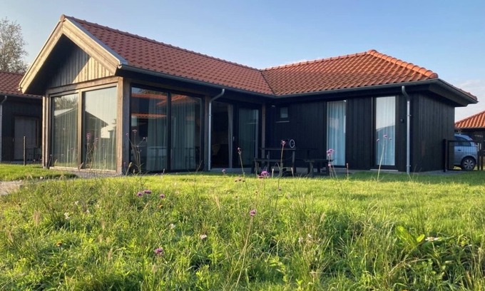 Anjum House | 4-person chalet Albatros by the water with parking space